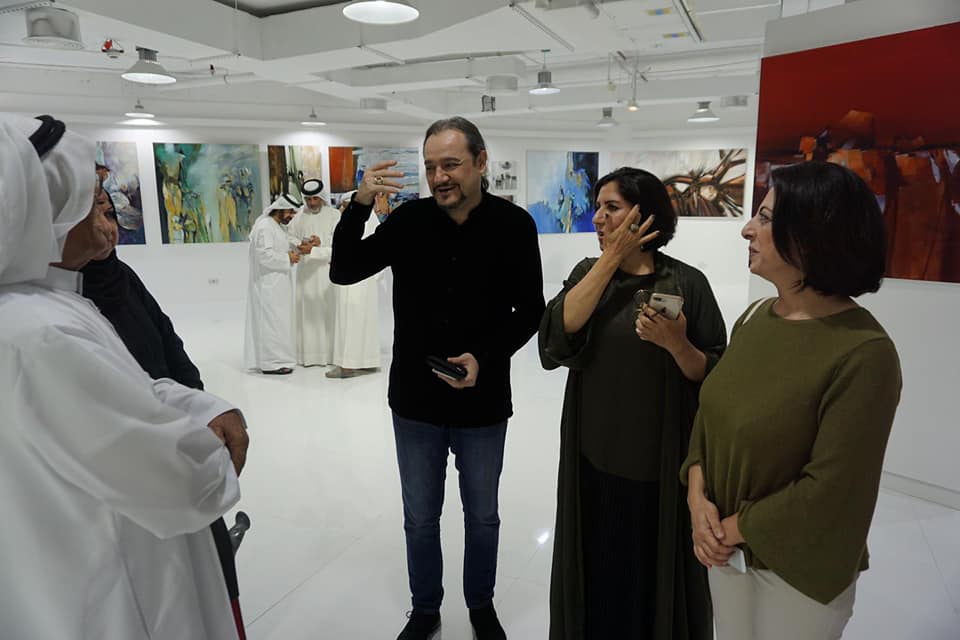 Lively Conversation at the Exhibition